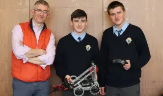 (L-R) Eoin McDonnell, Conor Walsh and Eoin Caverly from Ardscoil Rís, Co. Dublin with their robot. 