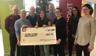 Yvonne Carr and Laura Magennis of Dundalk Simon Community, receiving their cheque from Emma Farrelly, Colm Kearney and Cara Robinson, with DkIT lecturers John McDonald, Myles Hackett and Edel Healy