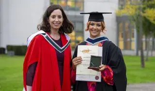 Aoife Mulholland, who won the President’s Prize for Academic Excellence and graduated from the BA (Hons) in Youth Work with Dr Annaleigh Margey, Head of Department.
