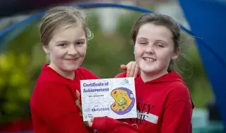 Payton Mason-Kenny and Lily Belle McKeon-Stowe celebrating Cell Explorers