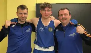 Chris O’Neill (centre) pictured with Ruairi O’Murchu (left) and his grandfather Jim O’Neill (right)