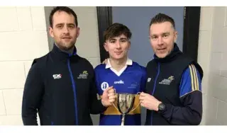 O’Neill pictured with Shane Lennon (left) and Oisin McConville (right) after DkIT’s Fresher Championship win